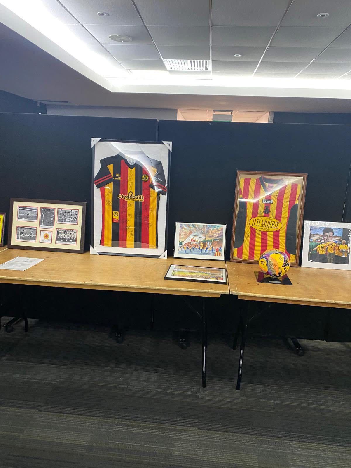 Framed signed Partick Thistle shirts and memorabilia up for auction at a past DSA quiz night